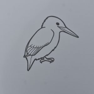 A raised line drawing of a kingfisher with a braille title. Also available with a print or large print title.